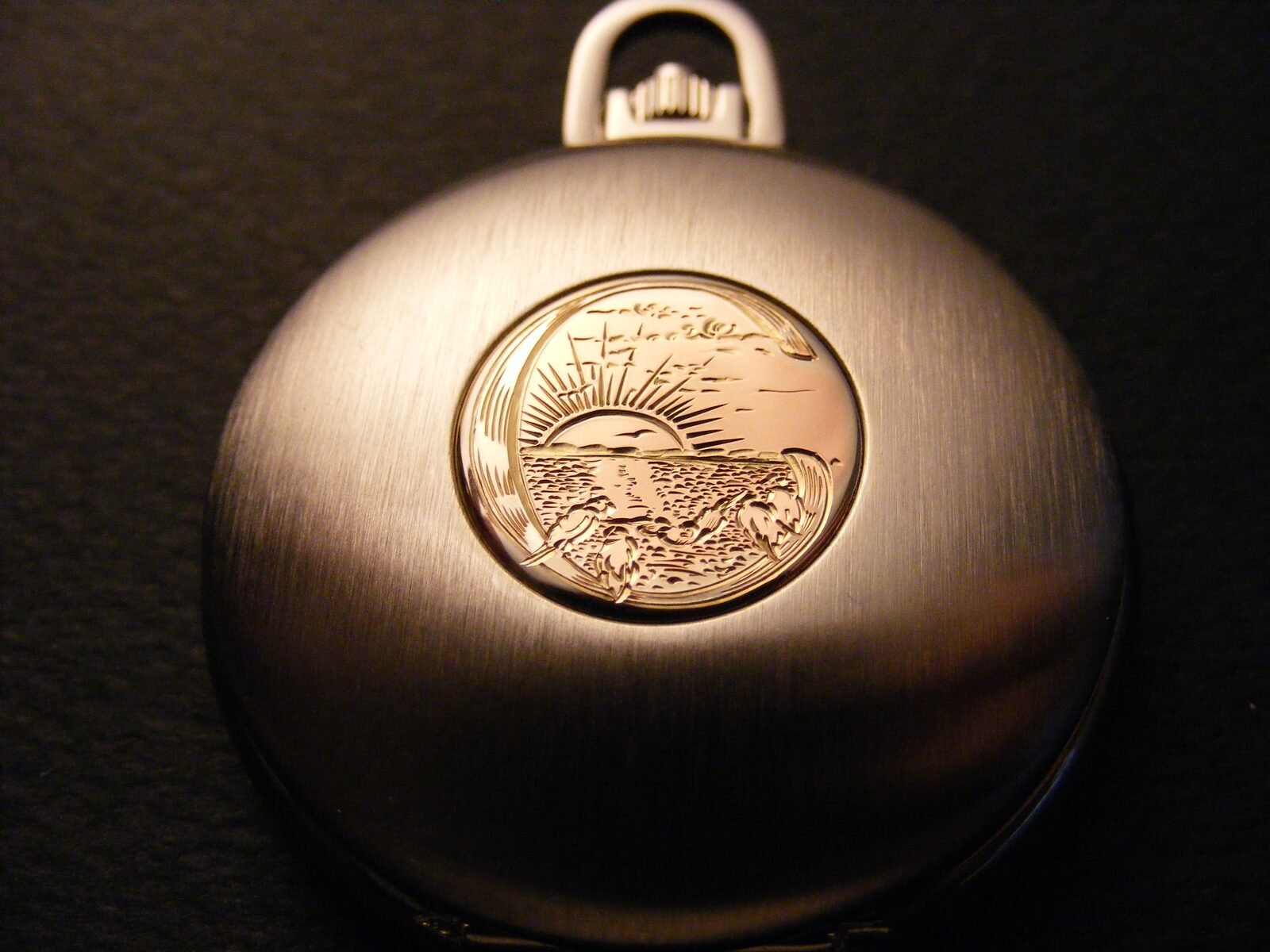 Gravierte Taschenuhr
